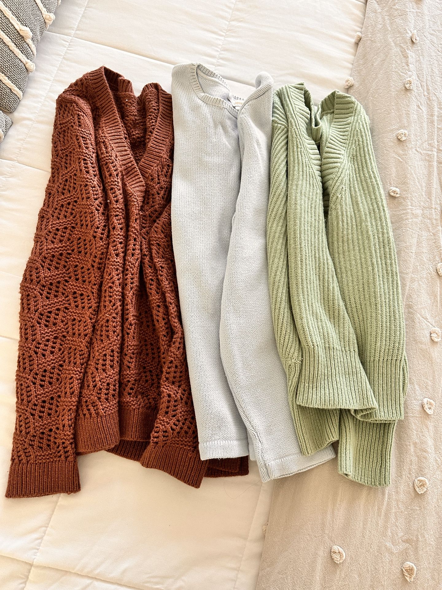 bundle of women's sweaters