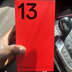 OnePlus 13 (model CPH2655, Black Eclipse color variant), with 16GB RAM and 512GB storage.