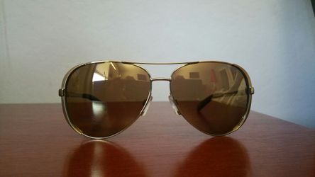 Michael Kors "polorized" sunglasses and case.