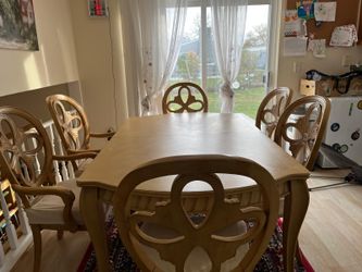 Solid Wood Dining table and six chairs and extra leaf for the table