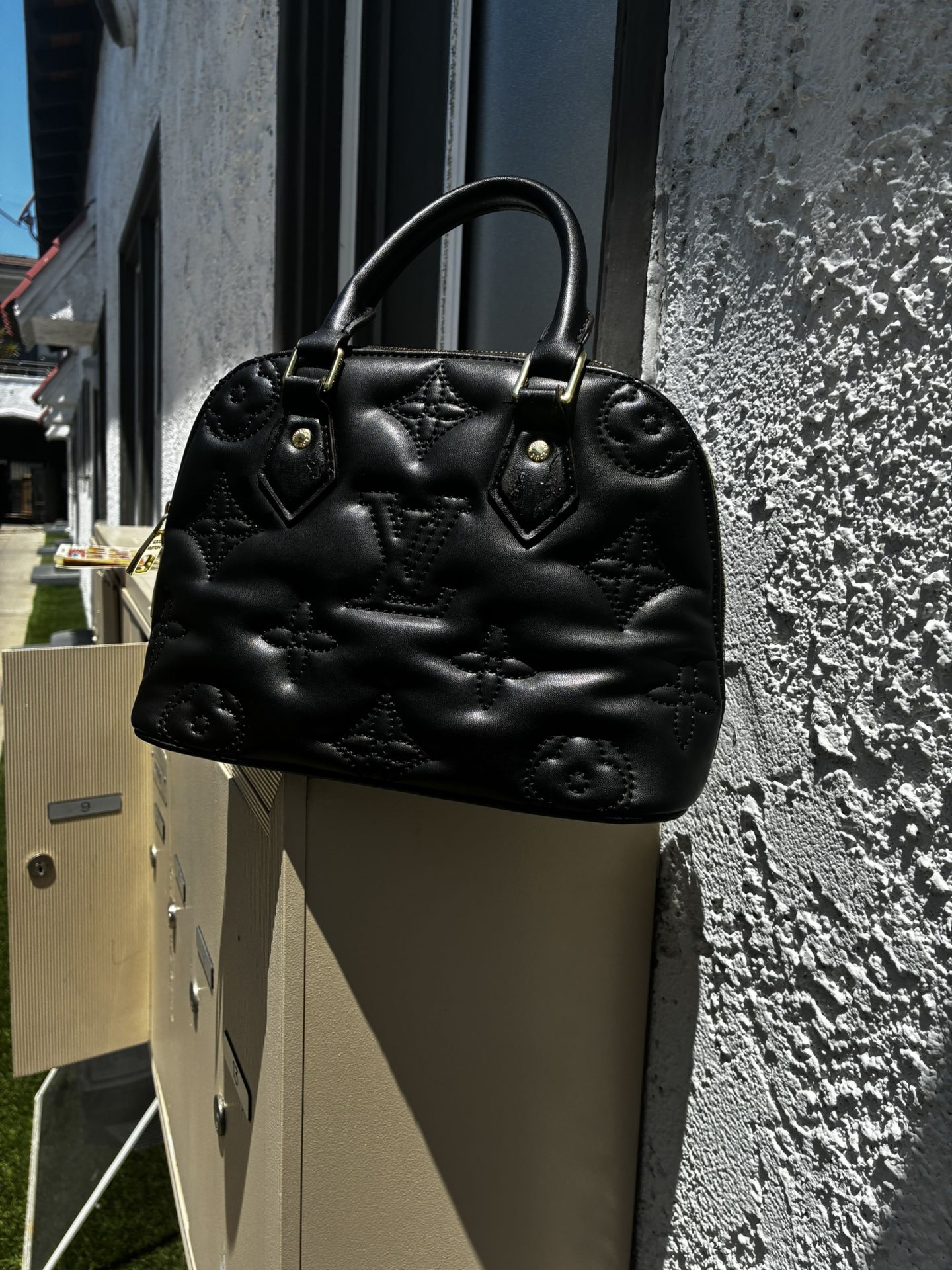 Louis Vuitton Alma BB in Monogram Empreinte Puffy Leather β