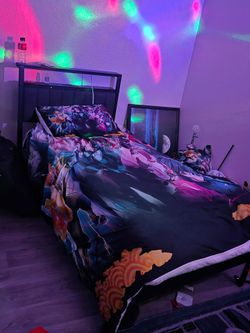 Twin bed with led lights and usb plug ins