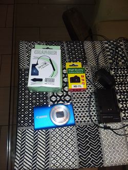 Canon 16 megapixel digital camera including charger battery except memory card
