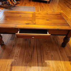 Solid Wood Coffee Table w/ Drawer. Some Nicks and Dings. 48x24x17H.