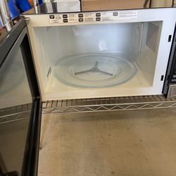GE Microwave 1200 Watts Almost New