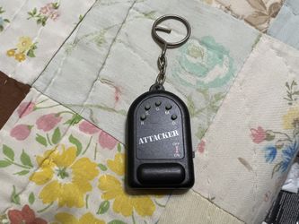 Attacker noisemaker keychain