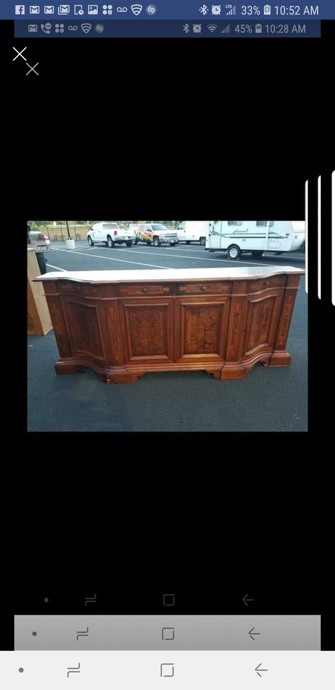 8ft long buffet server comes with key. In excellent condition