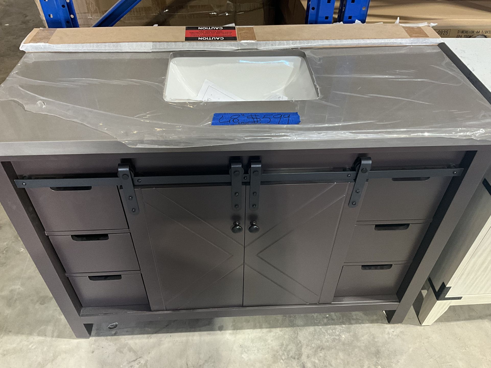 48” Bathroom Vanity in brown , single sink soft close solid wood with vanity top in white  $599  Luke’s liquidations warehouse Address:  2434 N Forsyt