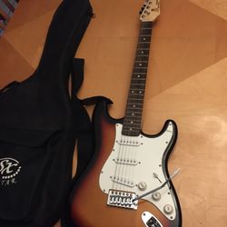 SX VTG Series Custom Handmade Electric Guitar (TRADE??) Excellent condition Stratocaster style, sunburst body, white pick guard, very little use (almo