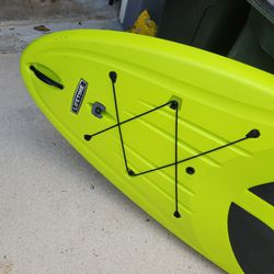 Like new 10 foot paddle board with paddle.
