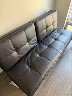 Foldable leather futon sofa
