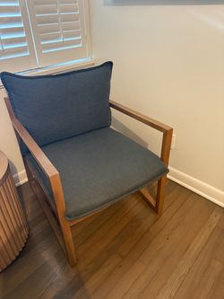 Set of two Threshold wood arm chairs with gray cushions