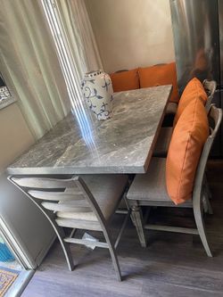 Beautiful grey , heavy duty marble table with 6 Chay