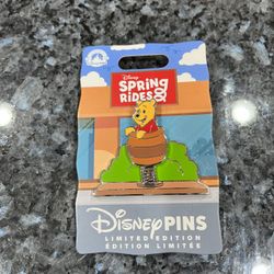 2024 Disney Parks Spring Rides Winnie The Pooh Pin.  Limited Edition of 4000.  Brand new on original card.  Smoke free home 