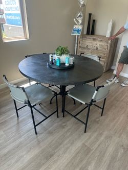 Round dinner table and chairs