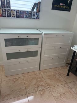 Two dressers, white with interchangeable clear cabinets