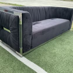 Black Sofa With Silver Trim