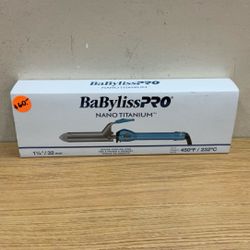 BABYLISS PRO 1-1/4” SPRING CURLING IRON.