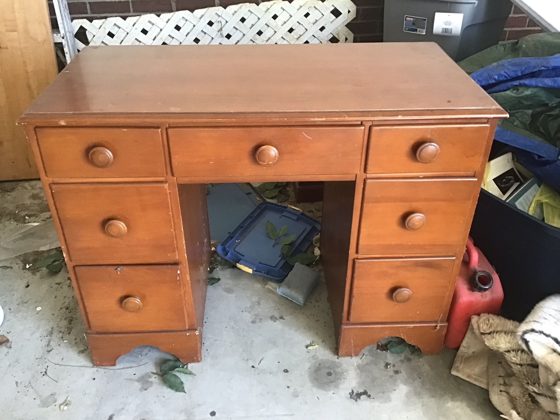 Desk- Library Style, Good Condition. 7 functional drawers. 30 inches high by 36 inches long by 19 inches in depth.