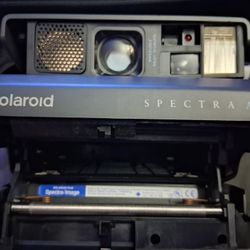 POLAROID  CAMERA W ACCESSORIES