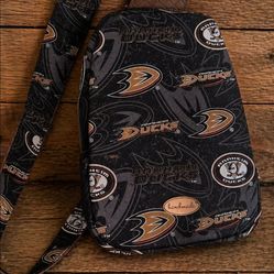 Anaheim Ducks crossbody sling backpack.