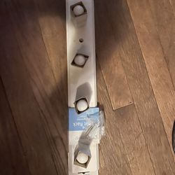 Various size coat hangers and utility hooks