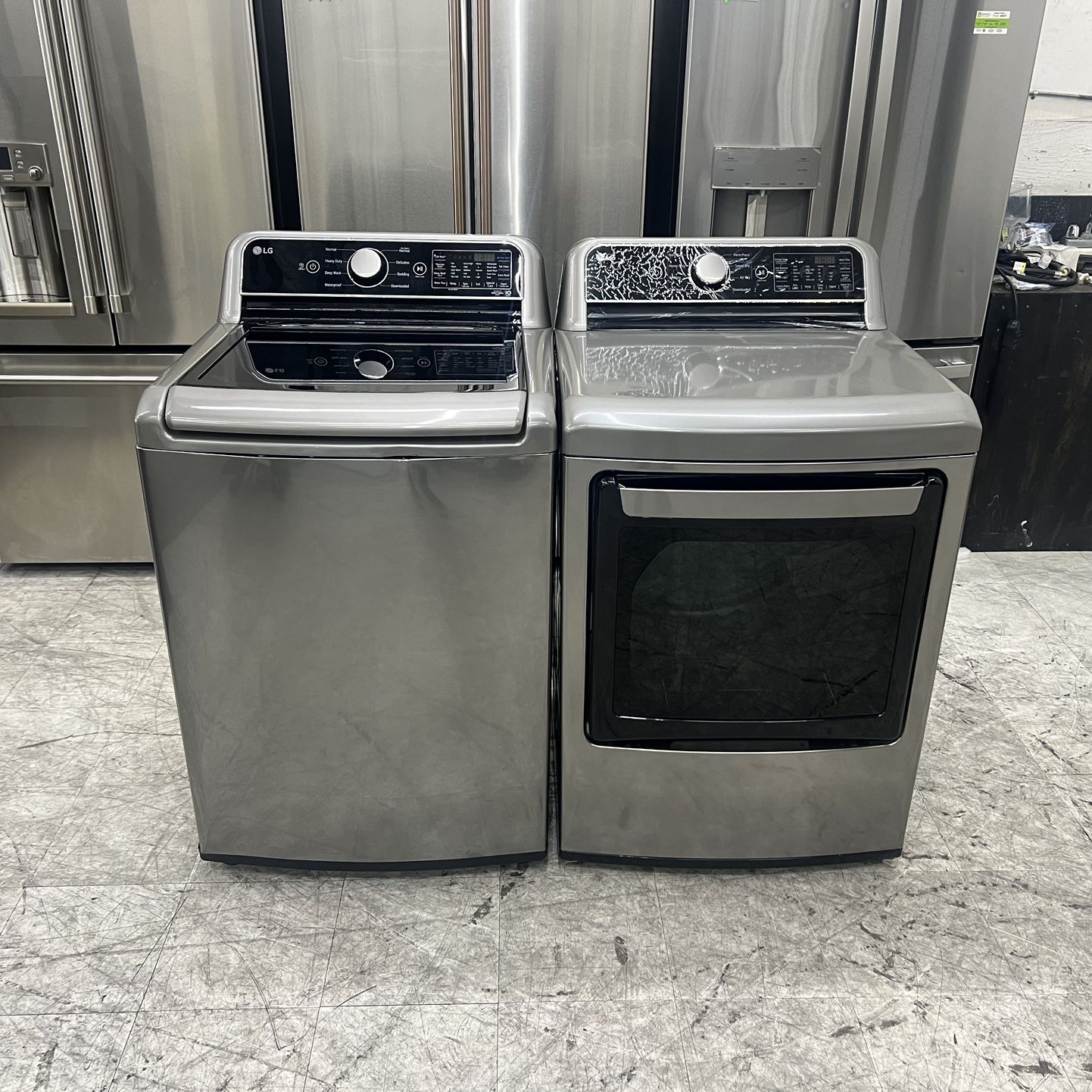 LG 5.5 smart top load washer and electric dryer in graphite