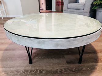 Round heavy Pure wood coffee table with glass protector.