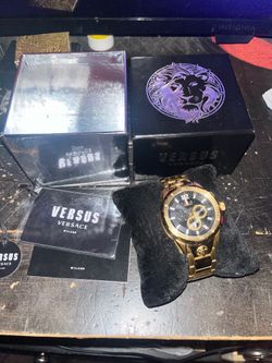 Gold Versace watch