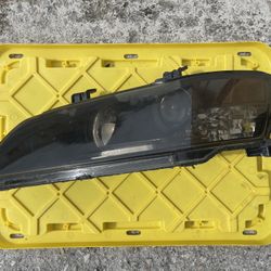 OEM Factory - Mitsubishi Lancer Evo 9 driver side headlight (repaired/blacked out)