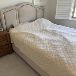 Queen beige upholstered bed