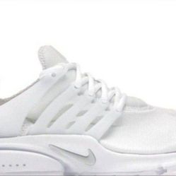 The White Nike Air Presto in Women's Size 6 is a sleek and stylish athletic shoe designed for comfort and performance.

