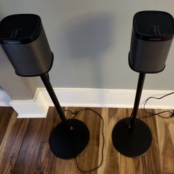 Two Sonos Play:1 Speakers with stands