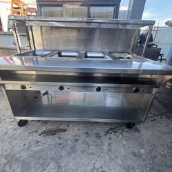 I have a 4-tub 220v steamer compartment with drain in very good condition, like new.