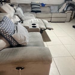 Microfiber sectional coach with automatic foot rests use condition