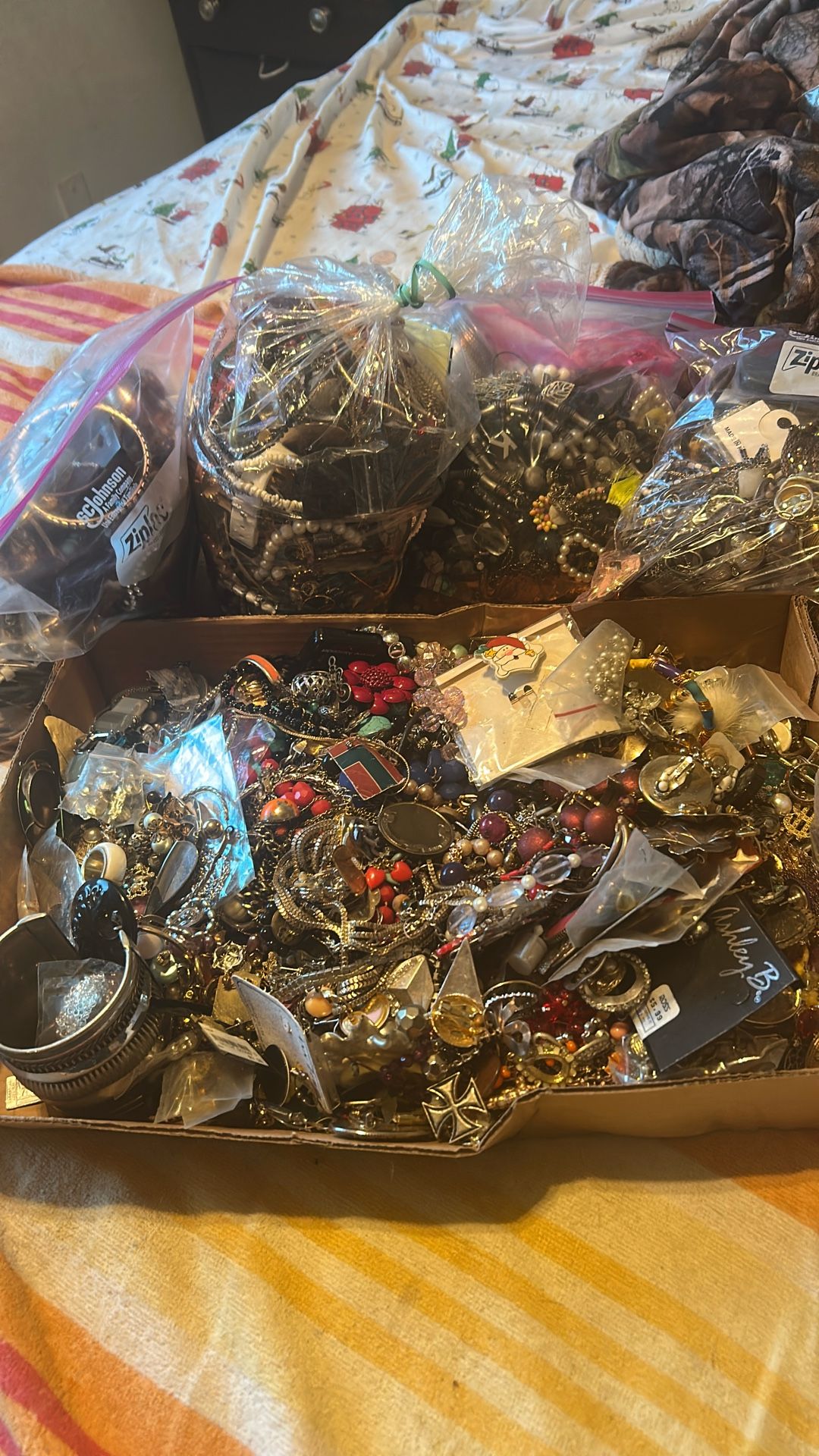 Ford Large bags, and one box full of random jewelry. Take all For60.