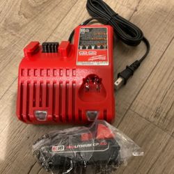 Milwaukee m18 Red lithium CP 2.0 battery + m12/m18 charger $80 firm price cash / South Austin by William cannon near the I35 pick up