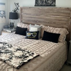 King size bed with wooden headboard