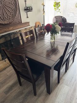 Dining room table with leaf and chairs
