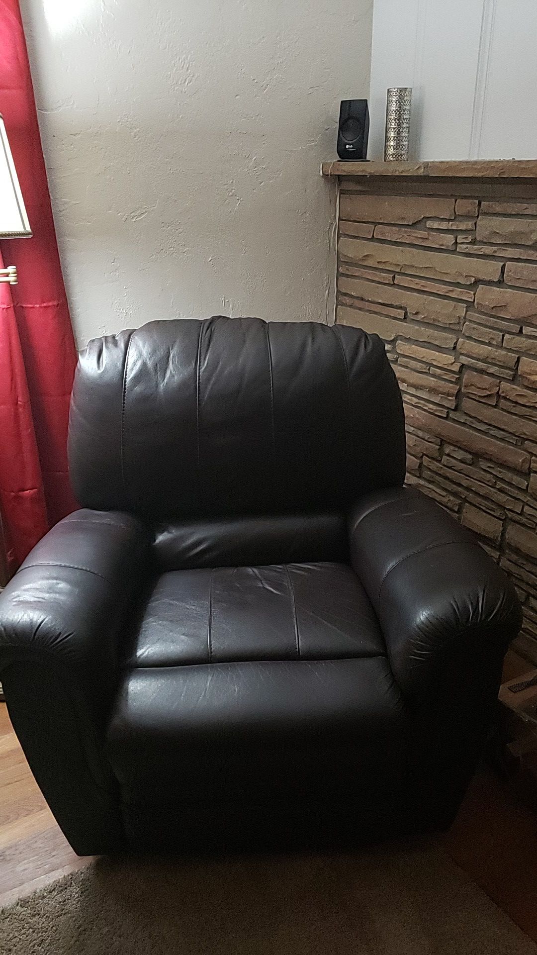 Very nice brown leather recliner hardly ever used like new