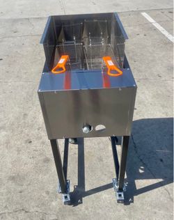 freidora de dos canastas de gas propano de acero inoxidable con drenaje