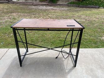 Desk with charging station