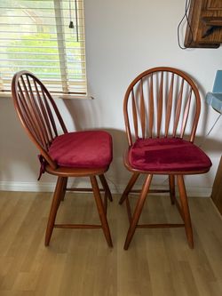 Pair of Wooden Windsor Swivel Barstools with Deep Red Cushions