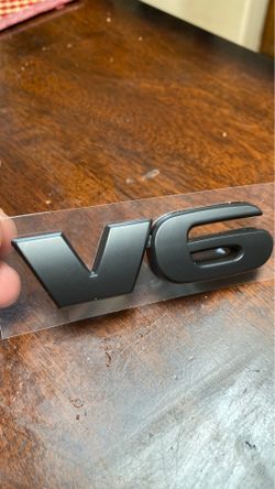 V6 Emblem