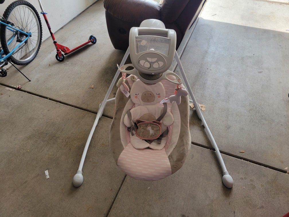 Ingenuity InLighten Baby Swing, Easy-Fold Frame, Swivel Infant Seat, Lights - Flora the Unicorn (Pink)