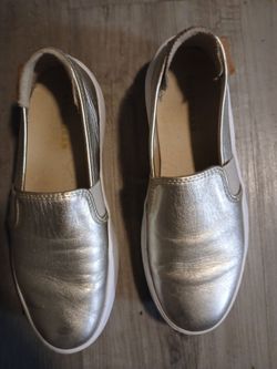 Gold Cole Haan slide on boat shoes 7B