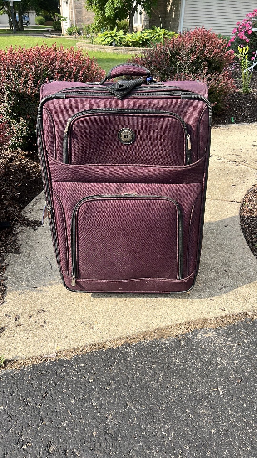 Leisure international L1 burgundy suitcase 29” x 19” x 12”