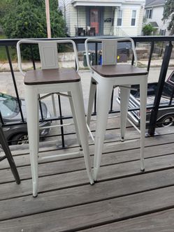 Set of white metal stools