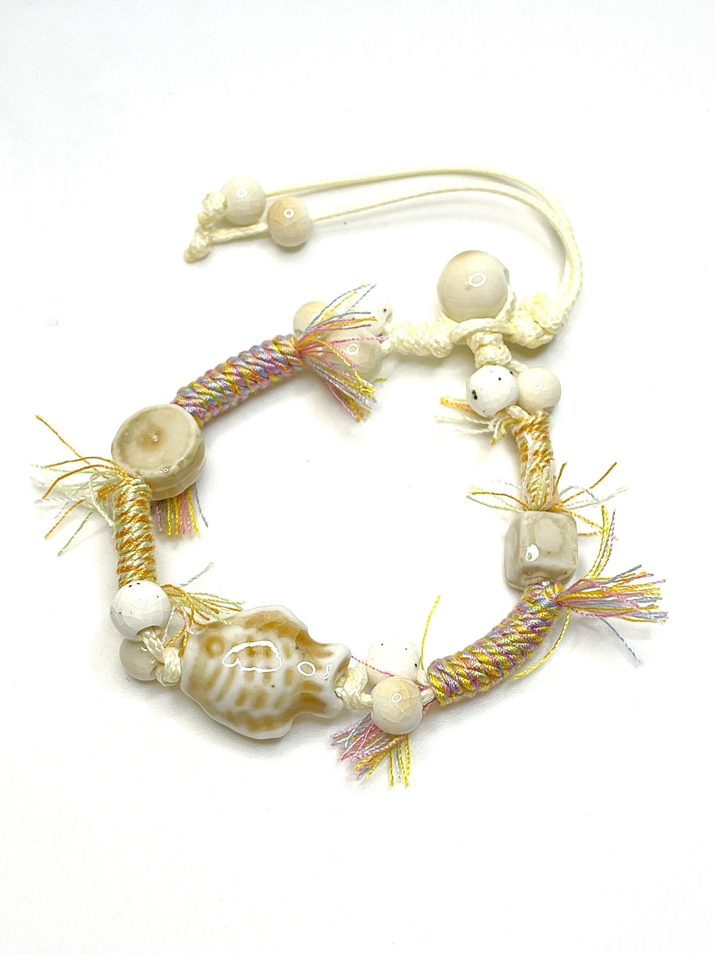 Tan ivory fringe Bracelet beaded ceramic fish beach shag look white