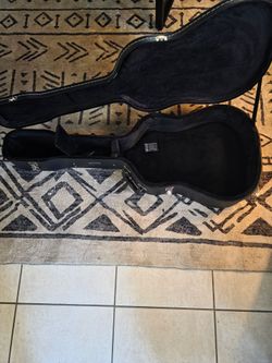 Fender acoustic hard shell case.